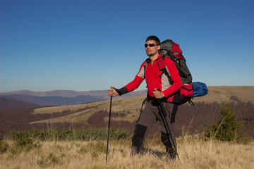 
    Hiker trekking in the mountains.