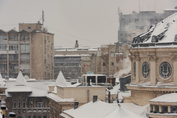 Bucharest in a winter day: Romanian Athenaeum, one of the most important landmarks in Bucharest.