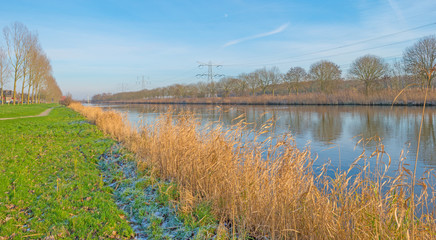 Canal through a rural landscape in winter