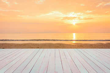 Empty top view of wooden table and view of sunset or sunrise on