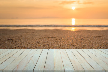 Empty top view of wooden table and view of sunset or sunrise on