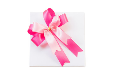 Pink ribbon bow and white gift box isolate on white with Clippin