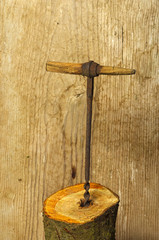 vintage manual brace with wooden background