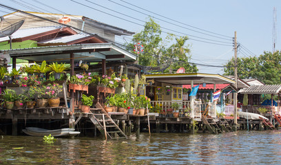 Fototapeta na wymiar Bangkok, Thailand - November 11, 2015: view from tourists boats on Chao Phraya river
