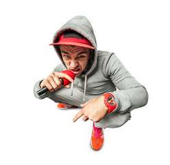 portrait of cool looking singing hiphopper in sportswear.