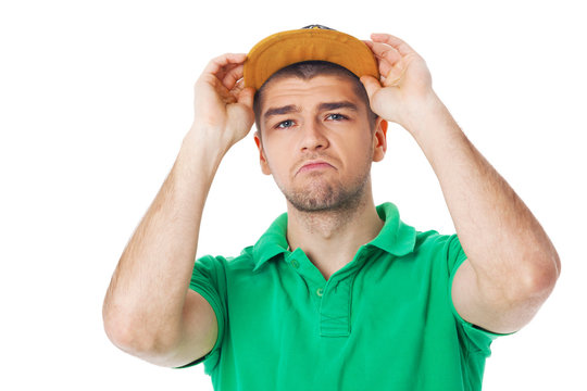  Young cool looking man posing in studio.