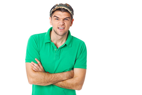 Young man saw something disgusting - isolated on white.