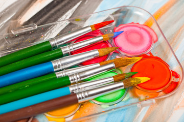 Brushes, paints, pencils for drawing
