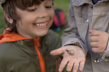 children learn snail, focus on snail