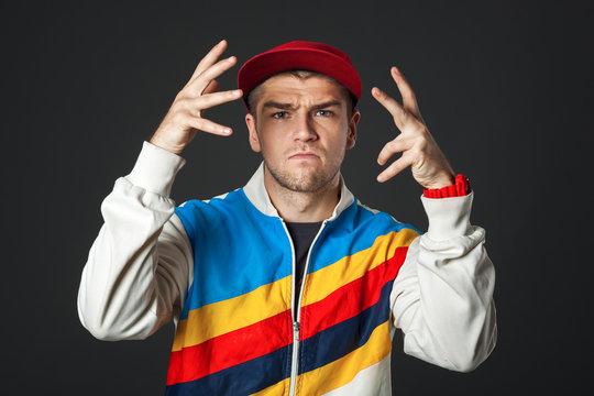 Portrait of cool looking young guy posing in studio.
