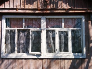 Windows of the old wooden house