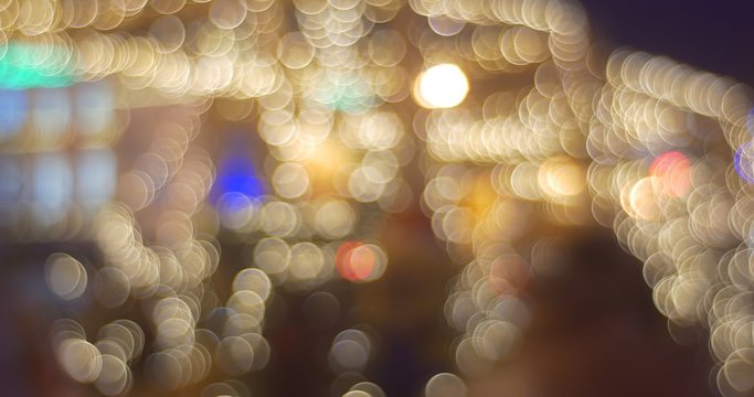 Blurred People Are Walking by Fir-Trees Alley Small Trees White and Yellow Lights Shining Garlands are on a Trees at Sofia Square New Year Kiev Ukraine