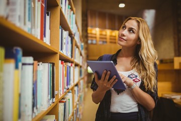 Smiling student using her tablet