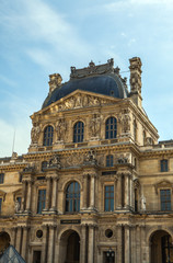 Fototapeta na wymiar PARIS, FRANCE - 02 SEPTEMBER, 2015: Building of Louvre in Paris, France.The museum is one of the world's largest museums and a historic monument. A central landmark of Paris.
