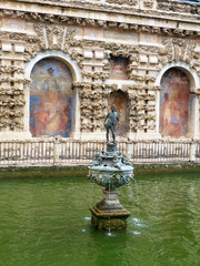Fountain and Statue in Alcazar Garden Seville.