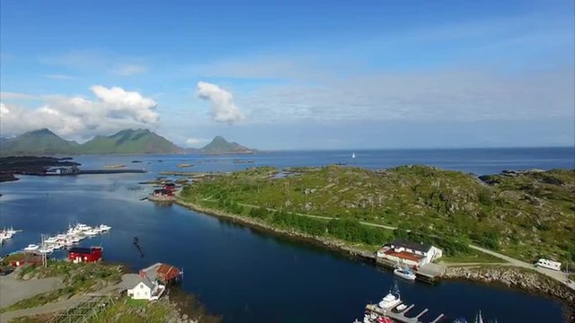 Aerial view of marina in Ballstad on Lofoten islands in Norway. Aerial 4k Ultra HD.