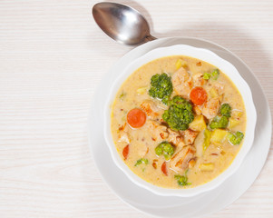 chicken soup with vegetables and cheese