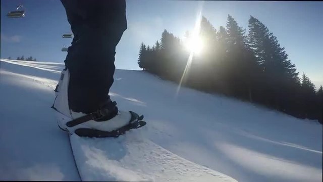 Snowboarding down the slope