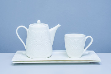 teapot and a cup on a tray