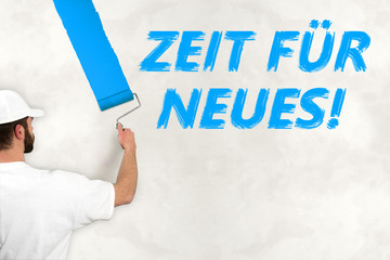 painter painting wall with blue color