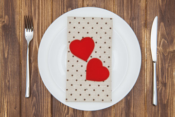 Celebrate valentine's day, Hearts shape and napkin on a plate