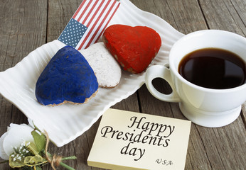 Heart shaped cookies color red, blue, white. Cup of coffee (tea) happy presidents day
