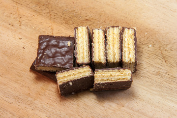 Cut of Chocolate Wafers on Wooden Table