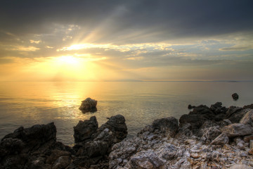 Beautiful sunset at the shores of Pag in Croatia. HDR
