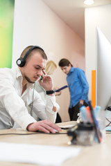Fototapeta premium Stressed businessman unable to cope the telephone