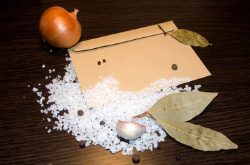 salt sprinkled on the table with envelope 