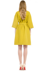 girl in a coat from the back isolated on white