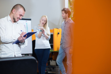 Portrait of young confident men employee dressed in casual cloth