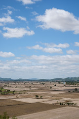 Mountain landscape and rice field with blue sky in Kanchanaburi,