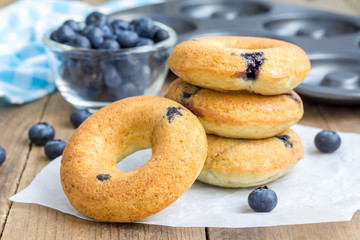 Freshly baked doughnuts with blueberries for breakfast