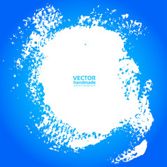 Round textured background with white paint on the blue backgroun