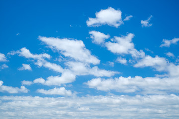 Naklejka na ściany i meble Abstract White clouds on a blue sky background