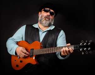 Obraz premium man with guitar