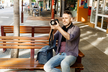 Male photographer taking picture