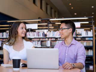 Two young students at the library