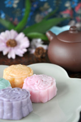 Colorful Mooncake and Tea pot on Background