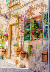 Fototapeta na wymiar Romantic view of a old mediterranean village house