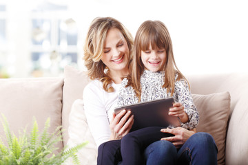 Mother and daughter at home