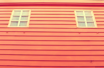 Window with orange wood background