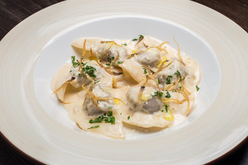 Tasty ravioli with parmesan