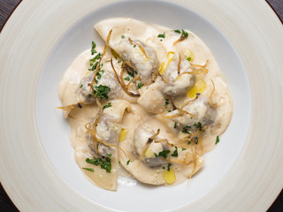 Tasty ravioli with parmesan