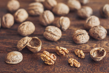 Walnuts on wooden background