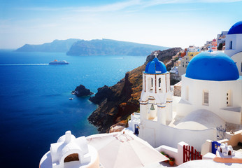Fototapeta premium view of caldera with blue domes, Santorini