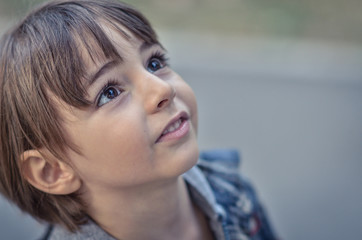 Obraz premium little boy portrait in the park