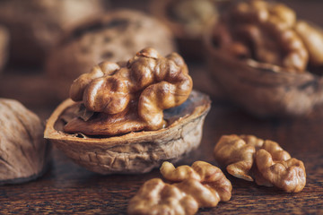 Walnuts on wooden background