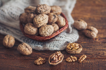 Walnuts on wooden background